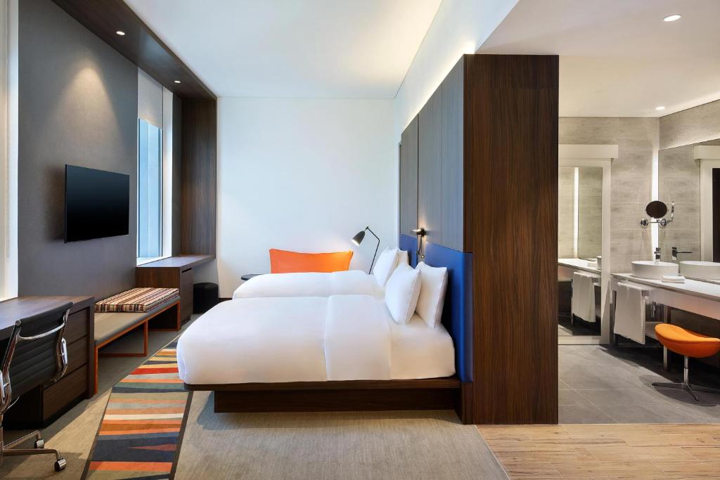 فندق ألوفت مطار دبي -الغرف والأجنحة